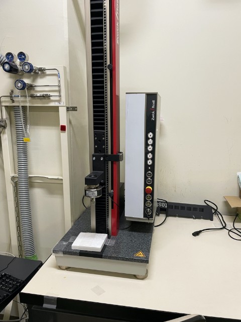 Tension and compression fatigue tester
